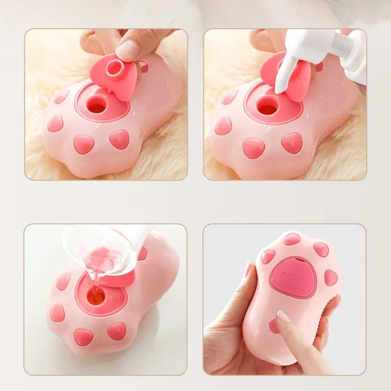 Cat paw style USB rechargeable pet spray massage brush on white background, compact ABS plastic grooming tool