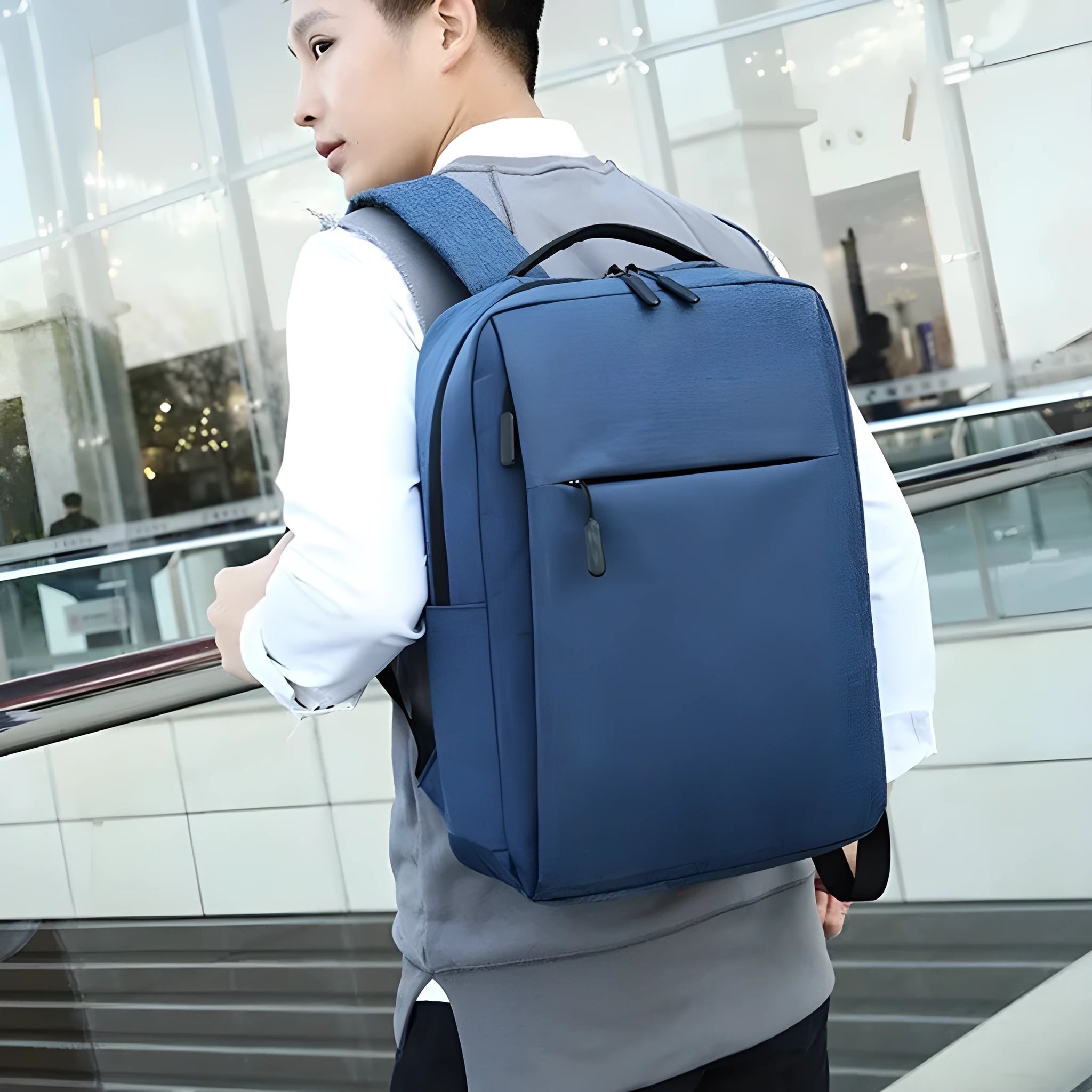 Large black sports backpack with multiple compartments, curved shoulder straps and USB charging port on side