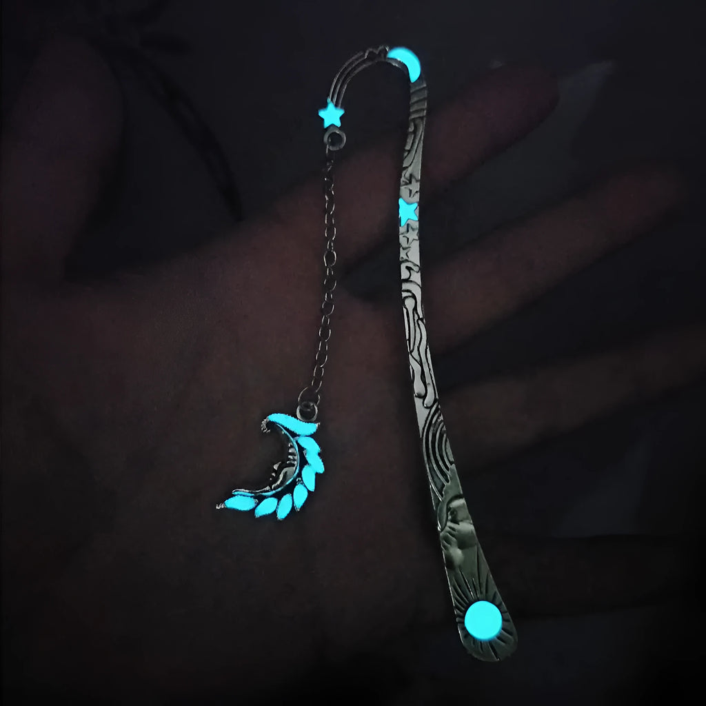 Retro five-pointed star glowing metal bookmark in ancient silver and bronze colours with celestial patterns