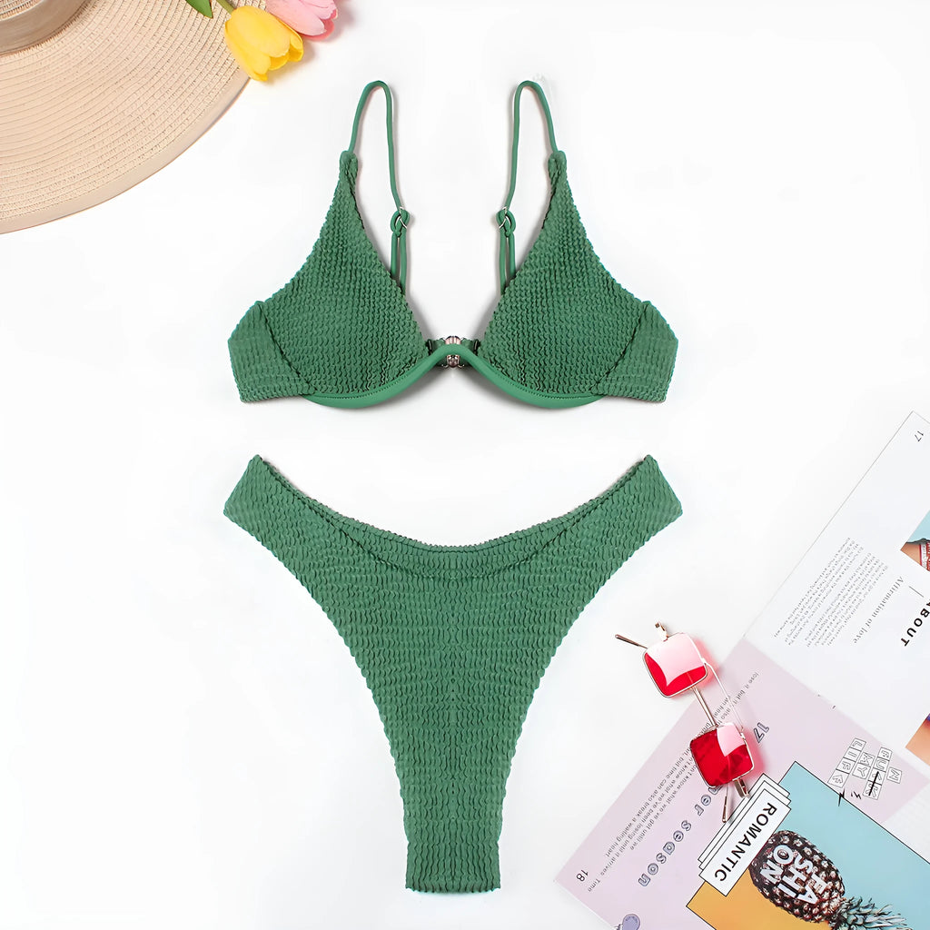 Green women's bikini with ruffle detail on quick-dry polyester fabric.
