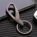 Zinc alloy double ring keychain in black, chrome, or nickel colour, shown with dimensions 8.3 by 3.5 cm.