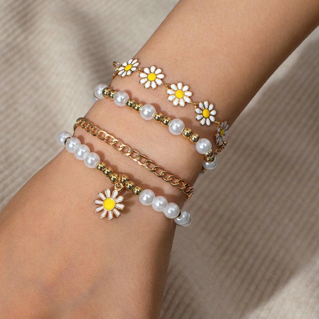 Four mixed material alloy bracelets with Little Daisy geometric charm in XY-4325 colour