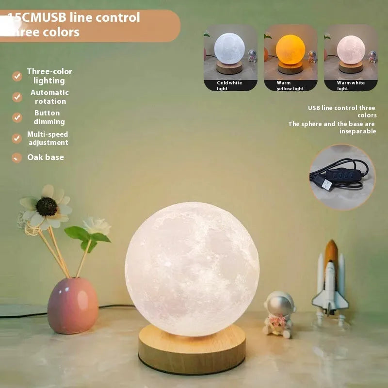 Rotating sleeping moon night lamp on wooden base showing three-colour light options.