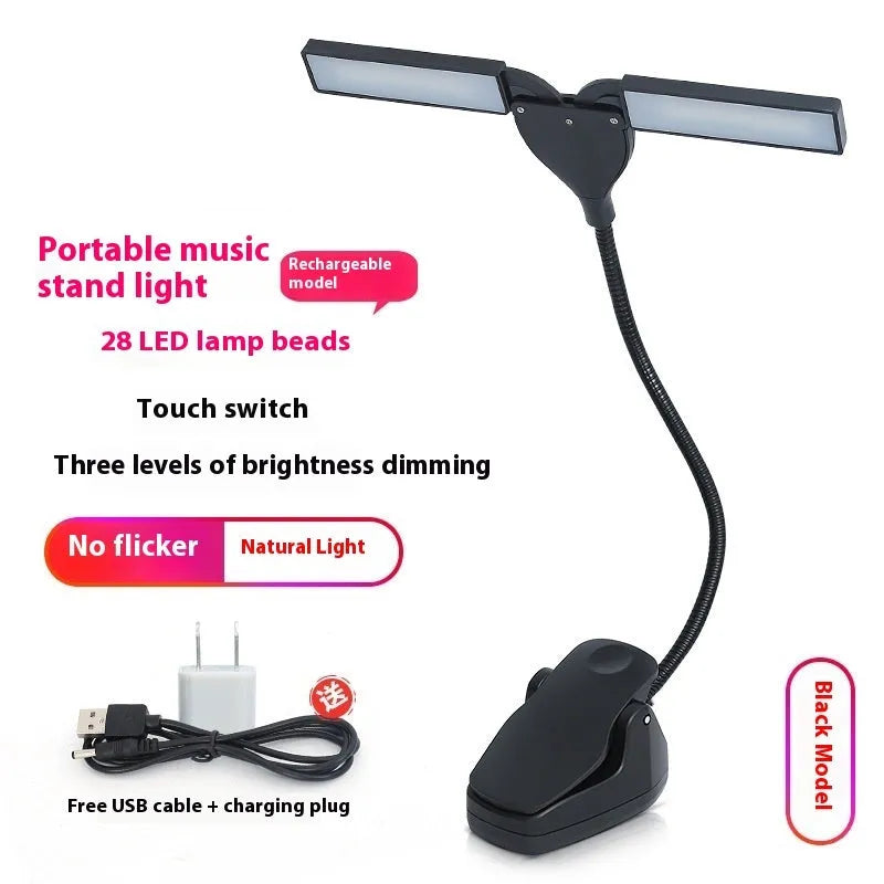 Black rechargeable music stand light with 28 LEDs and USB cable on a music stand.