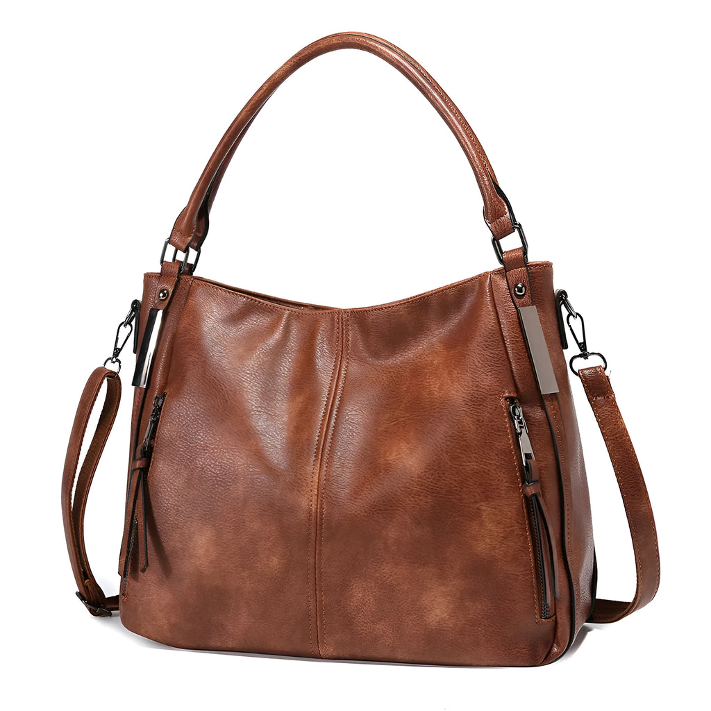 Soft PU crossbody shoulder bag in khaki with metal accent and double strap connectors on a white background