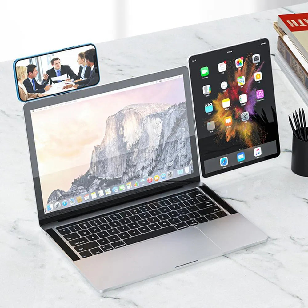 Aluminium laptop phone holder with magnetic mount attached to computer screen