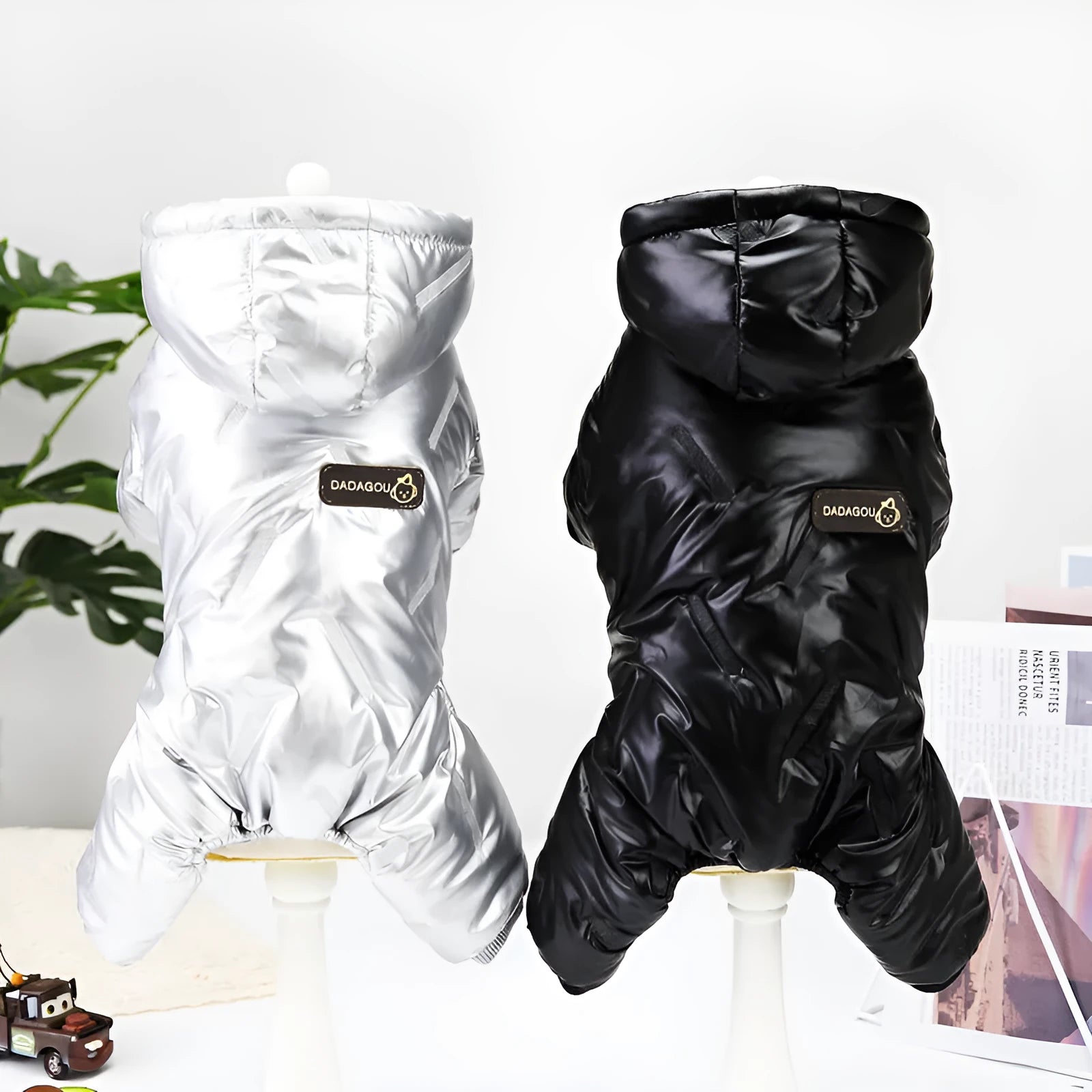 Pet dog waterproof autumn winter padded jacket in black cotton four-legged coat on white background