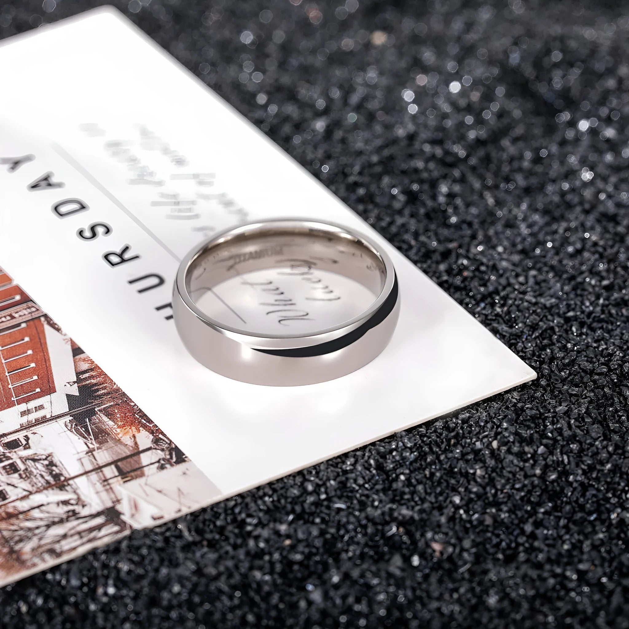 Silver titanium steel ring showing 2mm, 4mm and 6mm width options on size chart