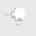 Round glass wall lamp with E27 holder, 150 mm diameter, 18 cm height, remote control, and petal shape.