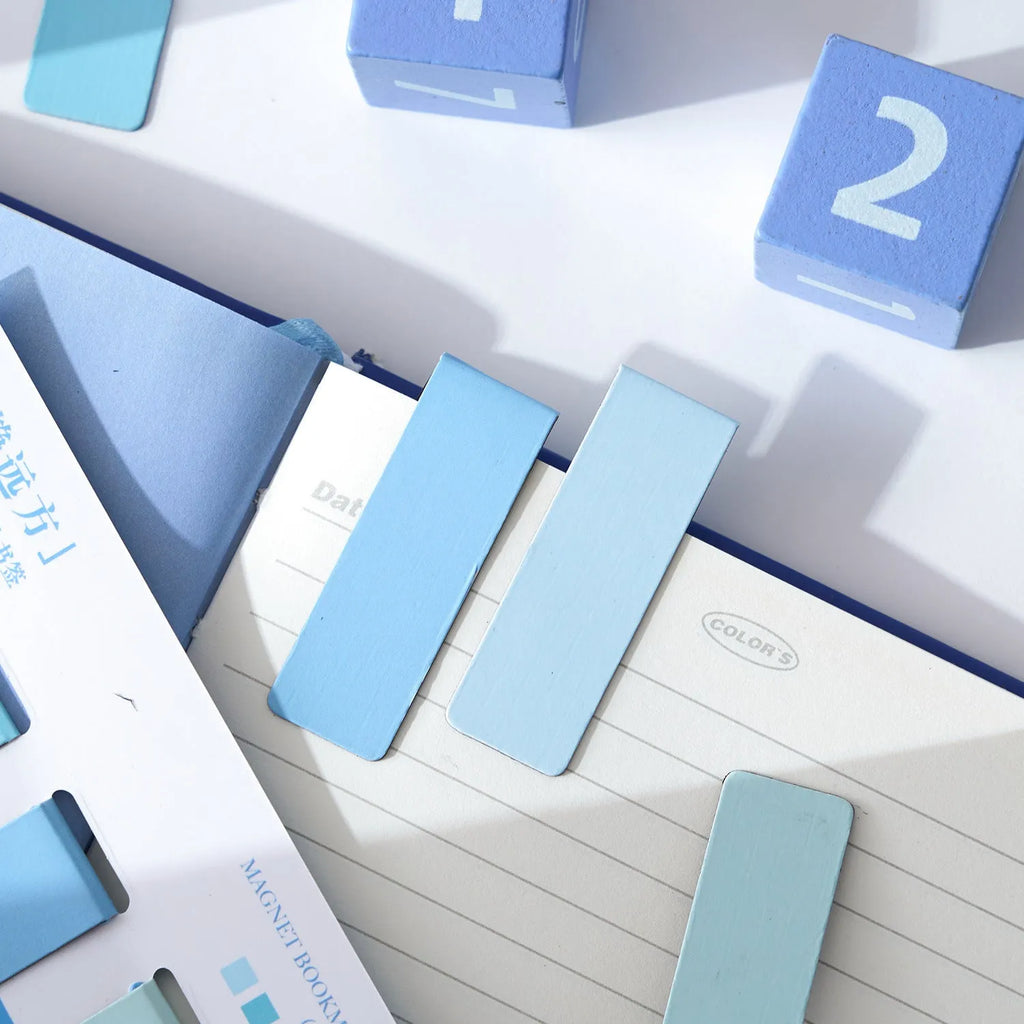 Set of four miniature magnetic bookmarks with Morandi colour block designs in different shades