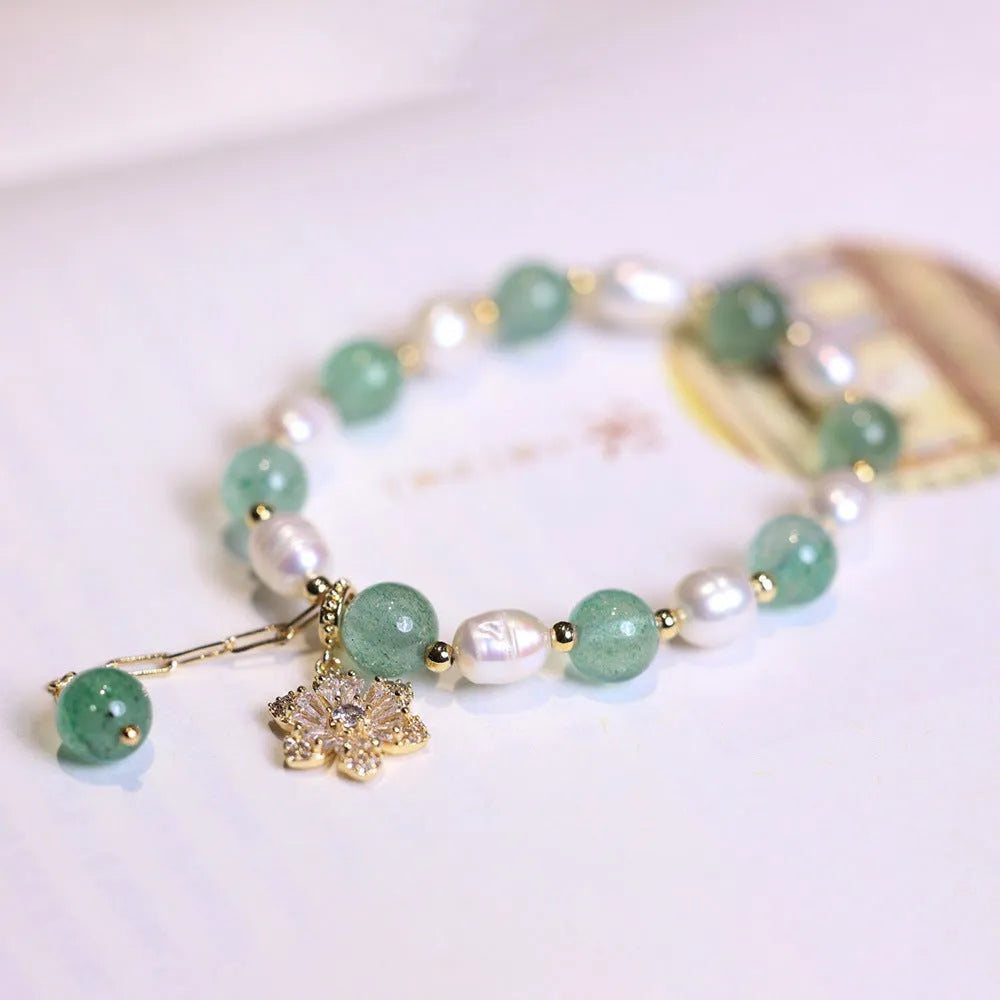 Green strawberry freshwater pearl bracelet with Chinese knot design and jade flower decorations