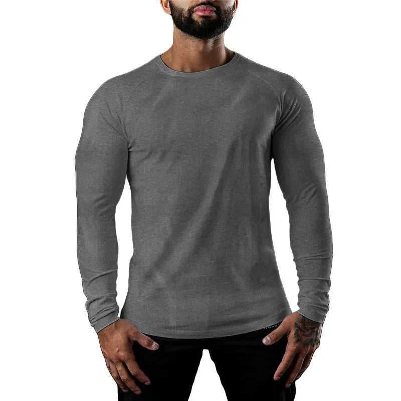 Men's fitted long sleeve cotton sports t-shirt in Army Green, shown on a model.
