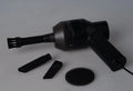 Black handheld desktop mini vacuum cleaner for cleaning keyboards and cars.