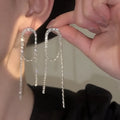 Silver knotted long tassel ear studs with zircon accents, copper base, electroplated finish, geometric shape