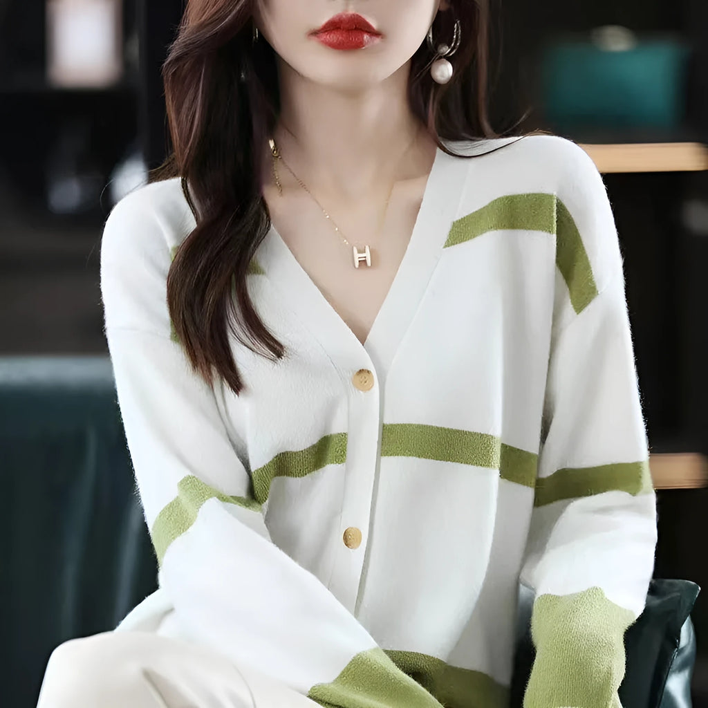 Women's slim fit striped V-neck knitted cardigan in a 3D pattern on a hanger.