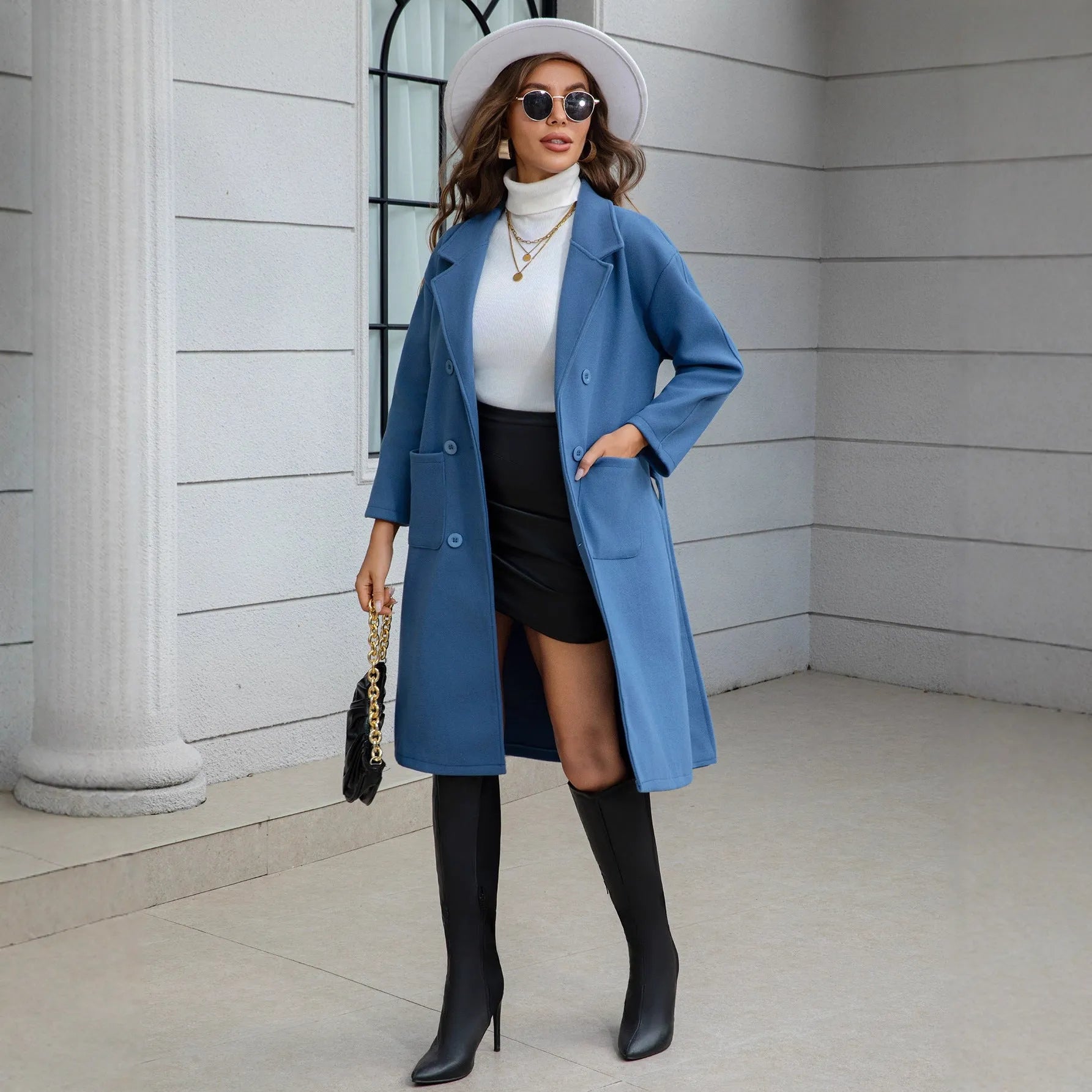 Blue waist-tie mid-length women's wool coat with patchwork pockets