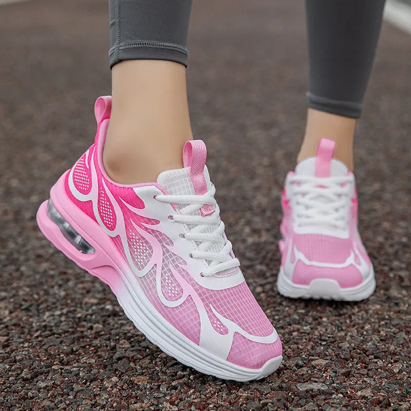 Women's casual mesh sneakers in pink colour with PU sole showing size tag