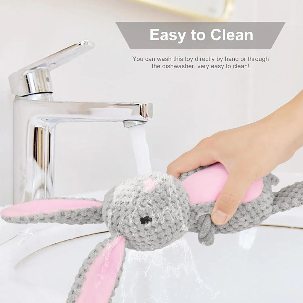 Animal-shaped plush dog toy with integrated cotton rope, shown in elephant, fox, monkey, pig, and rabbit designs.