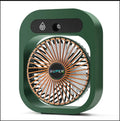 Green and white USB portable misting fan with humidifier function on desk