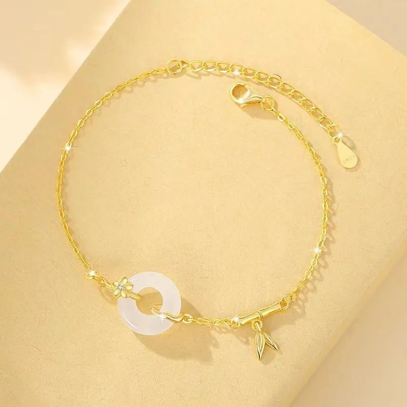 Women's silver bracelet with gold plating and white chalcedony starry sky design