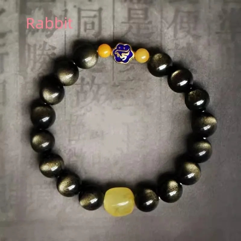 Natural golden obsidian bracelet with geometric zodiac charm bead showing chicken zodiac design