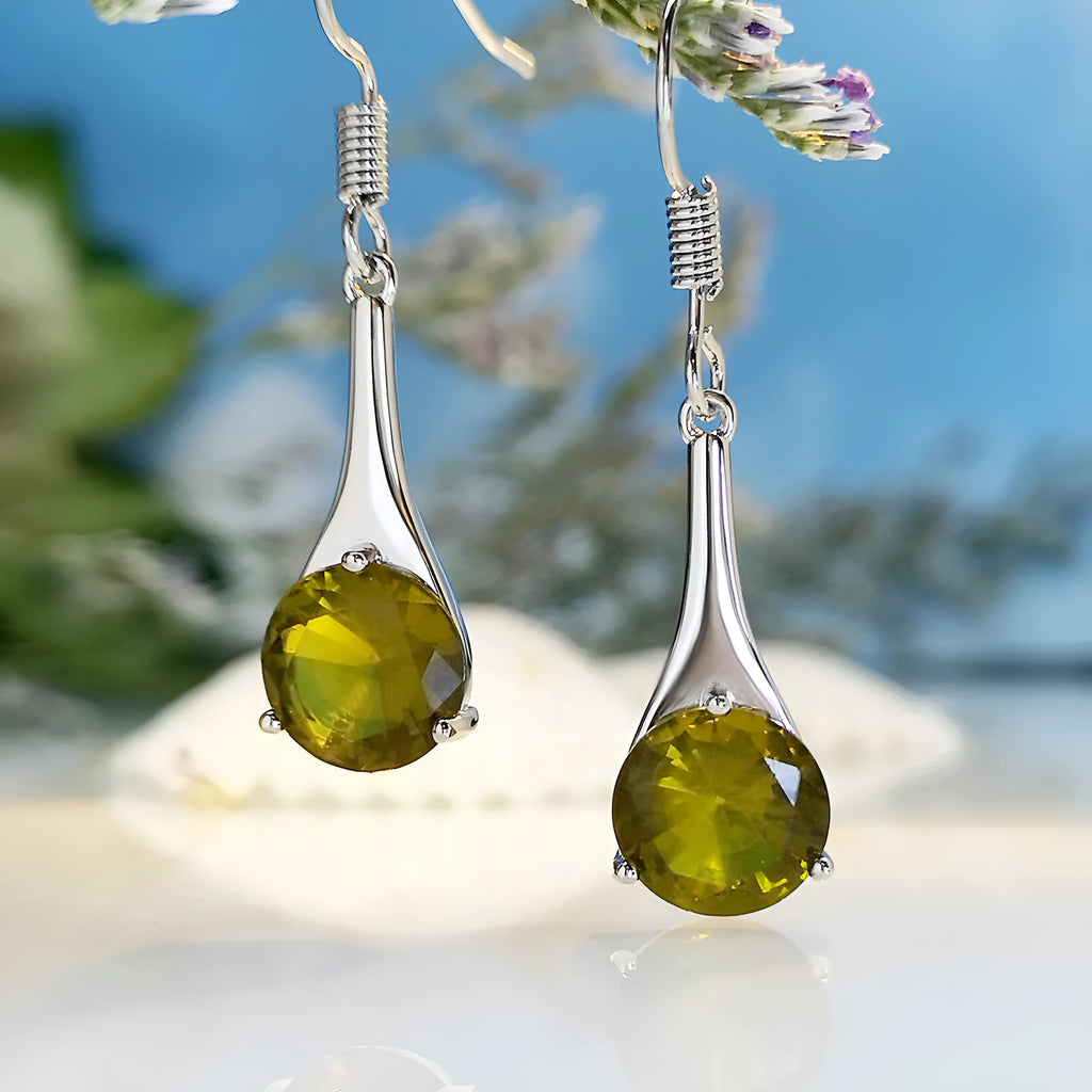 Olive green retro-style drop earrings with a minimalist water drop shape on a white background.