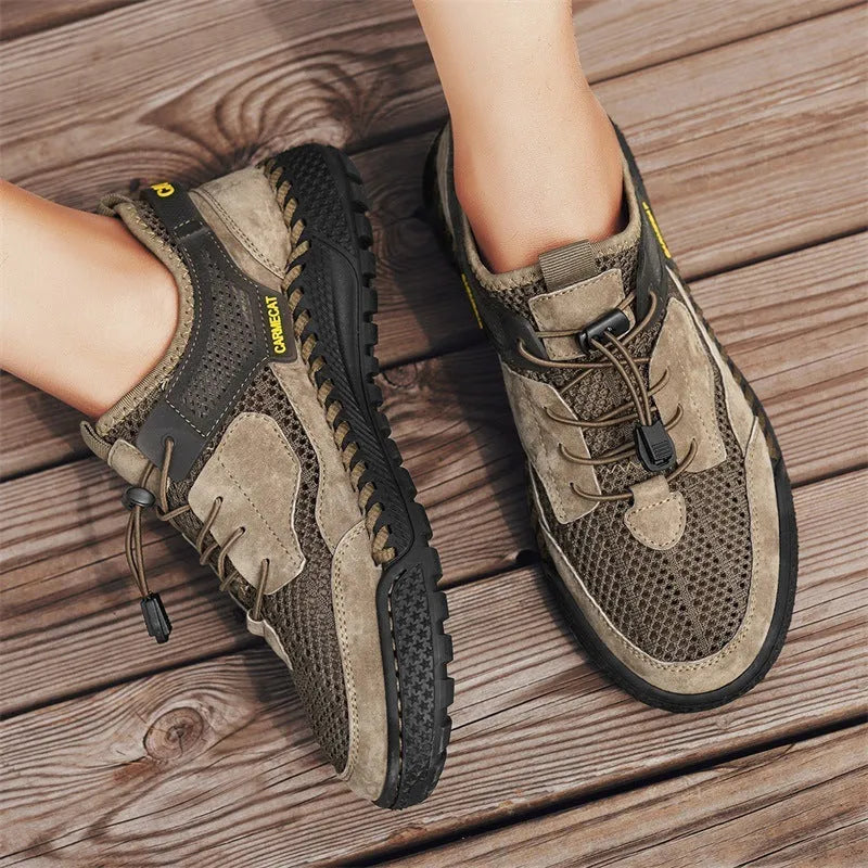 Men's brown suede low-top casual tennis shoes with elastic band and hand-stitched rubber sole.
