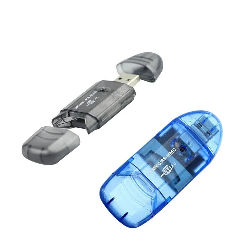 Transparent plastic USB card reader with optional LED light on a desk.