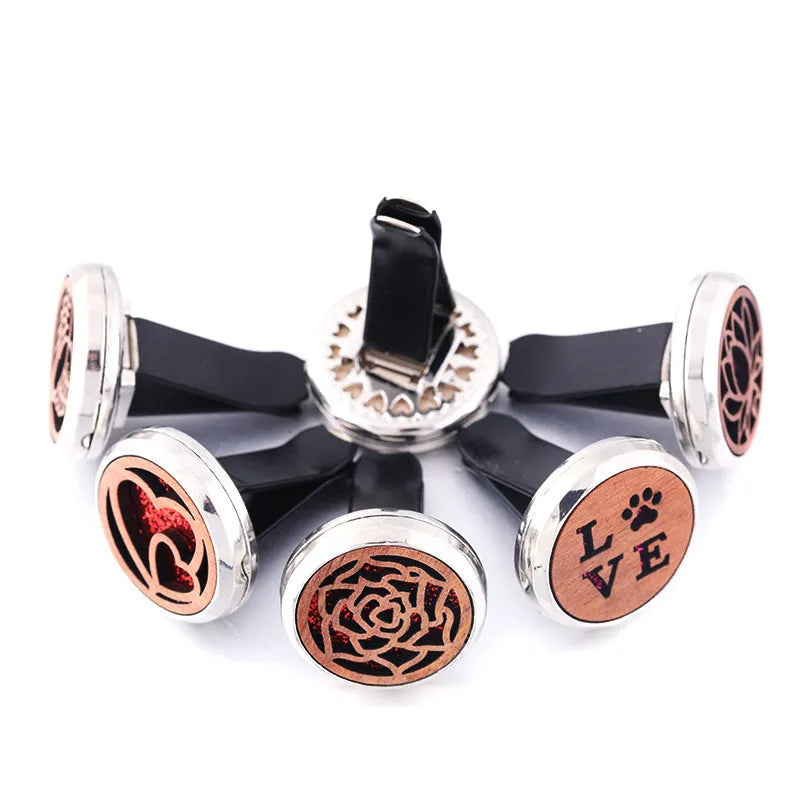 Round alloy and wood car aromatherapy clip for incense sticks, shown in a selected colour.