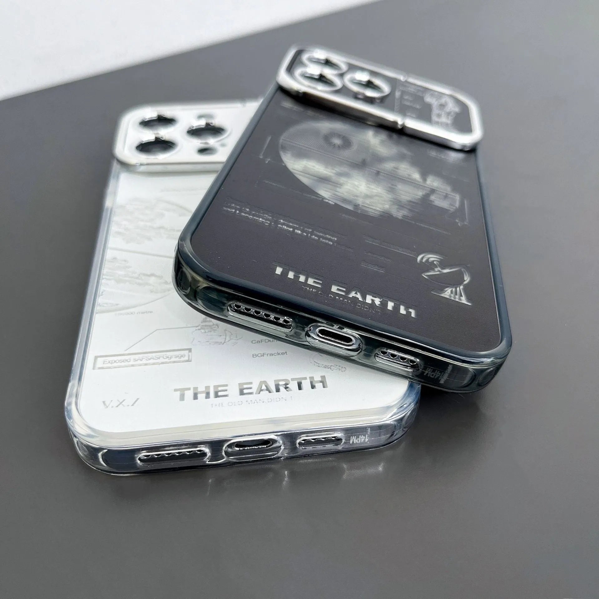Pleated bracket TPU phone case with metal planet design for iPhone 14 Pro, two colour options shown