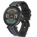 Smart watch with blood pressure monitor on a wrist, showing a black silicone strap and a silver case.