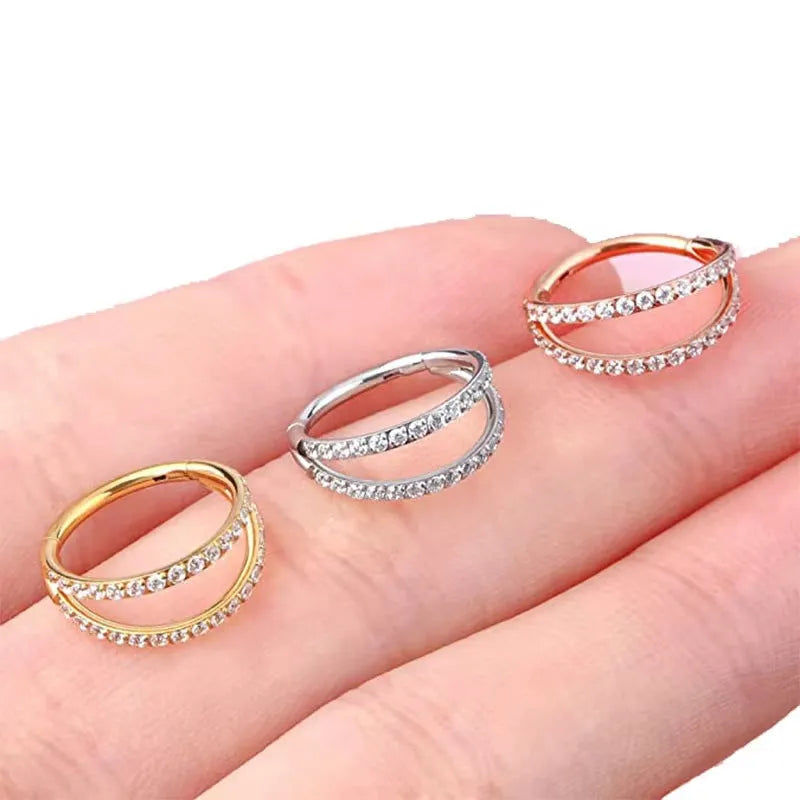 G23 titanium alloy lip and nose ring with zircon diamond finish in gold or steel colour, showing size options.