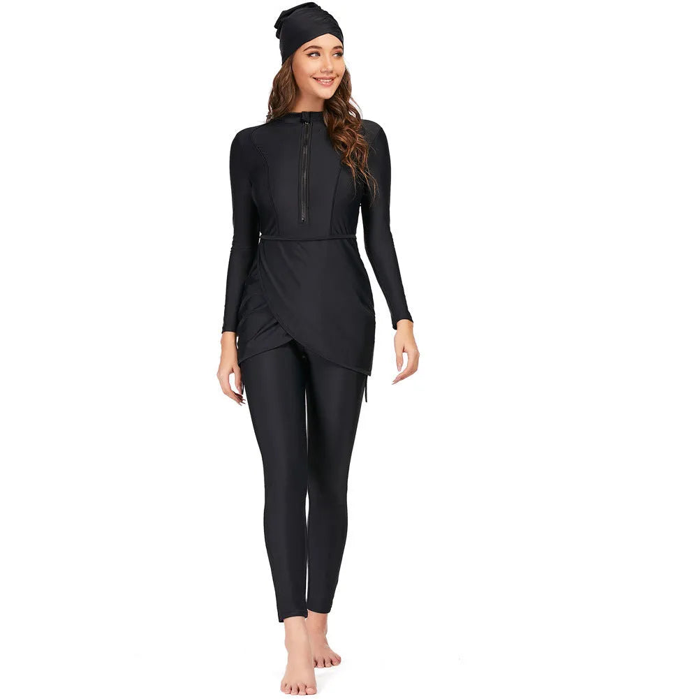 Black conservative long sleeve swimsuit for women with full coverage and skirt bottom option.
