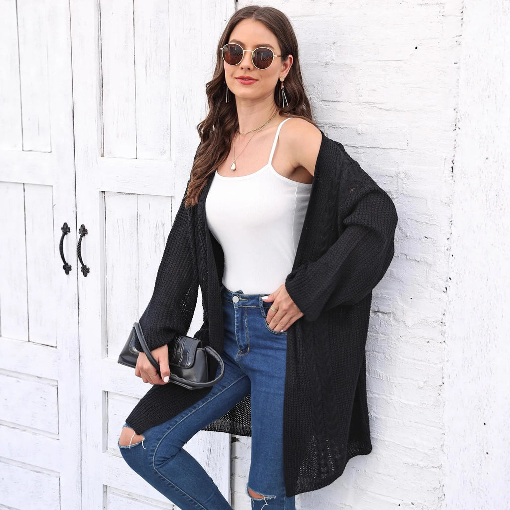 Women's loose-fit solid-colour acrylic sweater coat shown in light grey