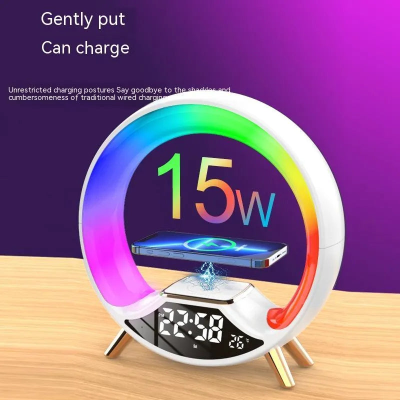 Black multifunctional bedside lamp with wireless charging pad, speaker, clock display, and adjustable night light.