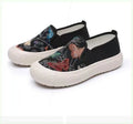 Women's Old Beijing-style slip-on canvas shoes in black or white with a round toe and plastic sole.