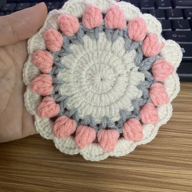 Handmade woven floral coaster in a choice of red, yellow, purple, or pink cotton and linen.