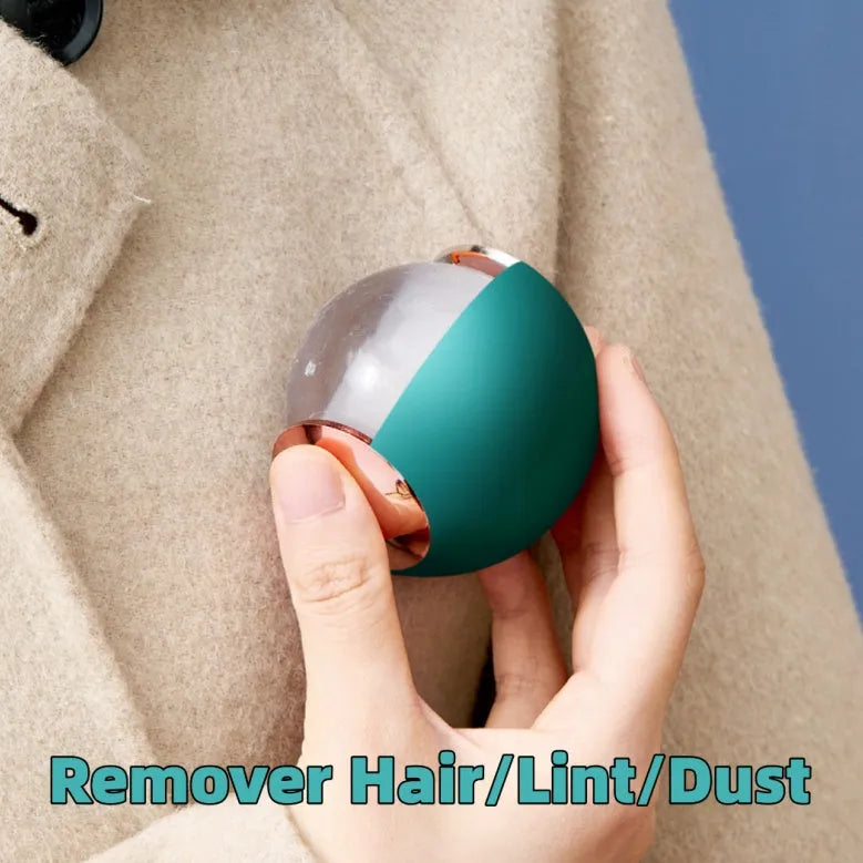 Green gold reusable gel lint roller with portable handle for pet hair removal.