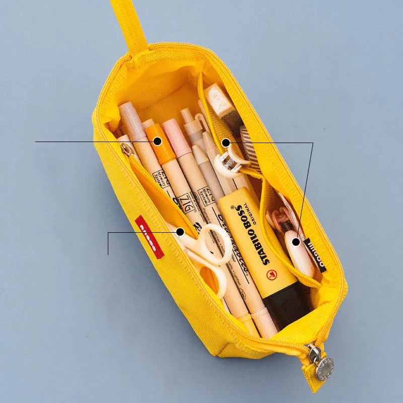 Oxford cloth pencil case with double zipper open showing interior compartment