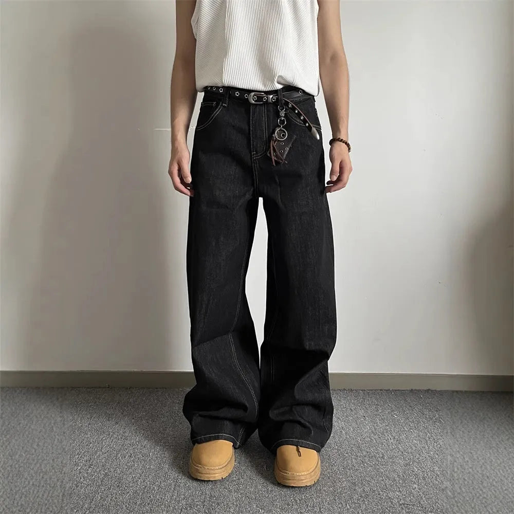 Black retro loose wide-leg jeans with a straight leg cut and zip fly on a mannequin.