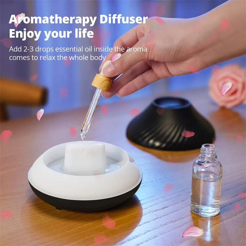 Beige and black aroma diffuser with LED flame lighting and 130ml water capacity