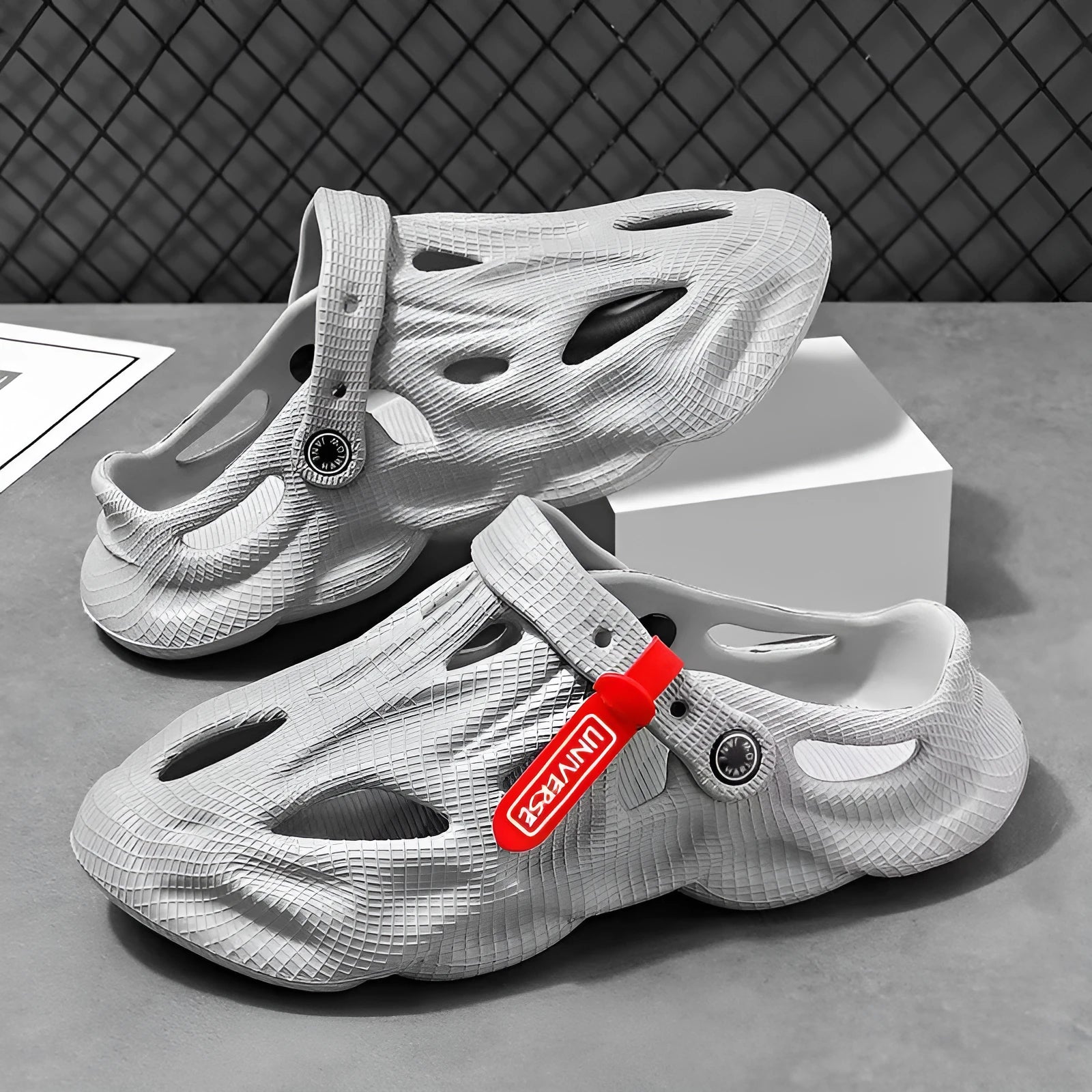 EVA coconut slippers with closed toe design in grey colour showing frosted processing texture