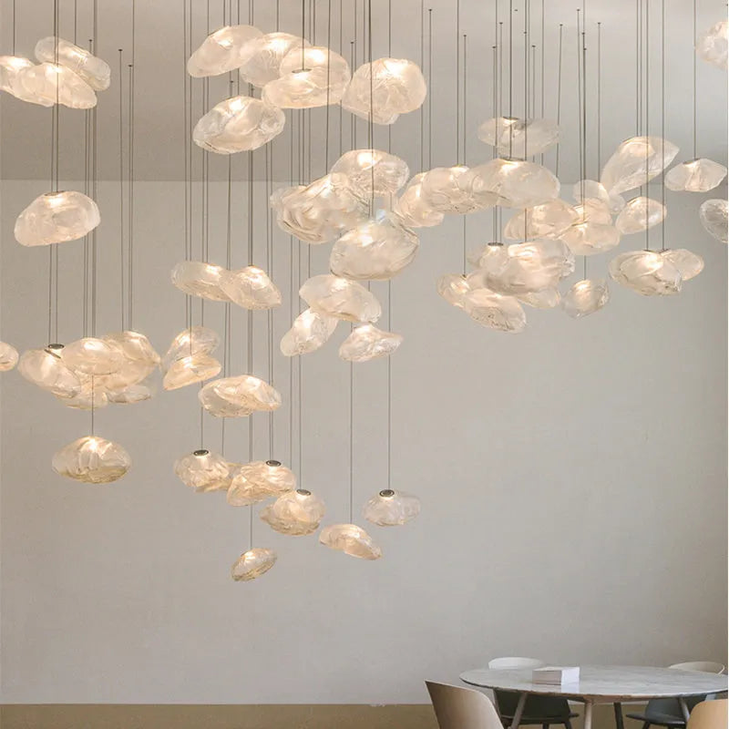 Modern fabric chandelier with glass shade in clear, amber, or smoke grey colour options.