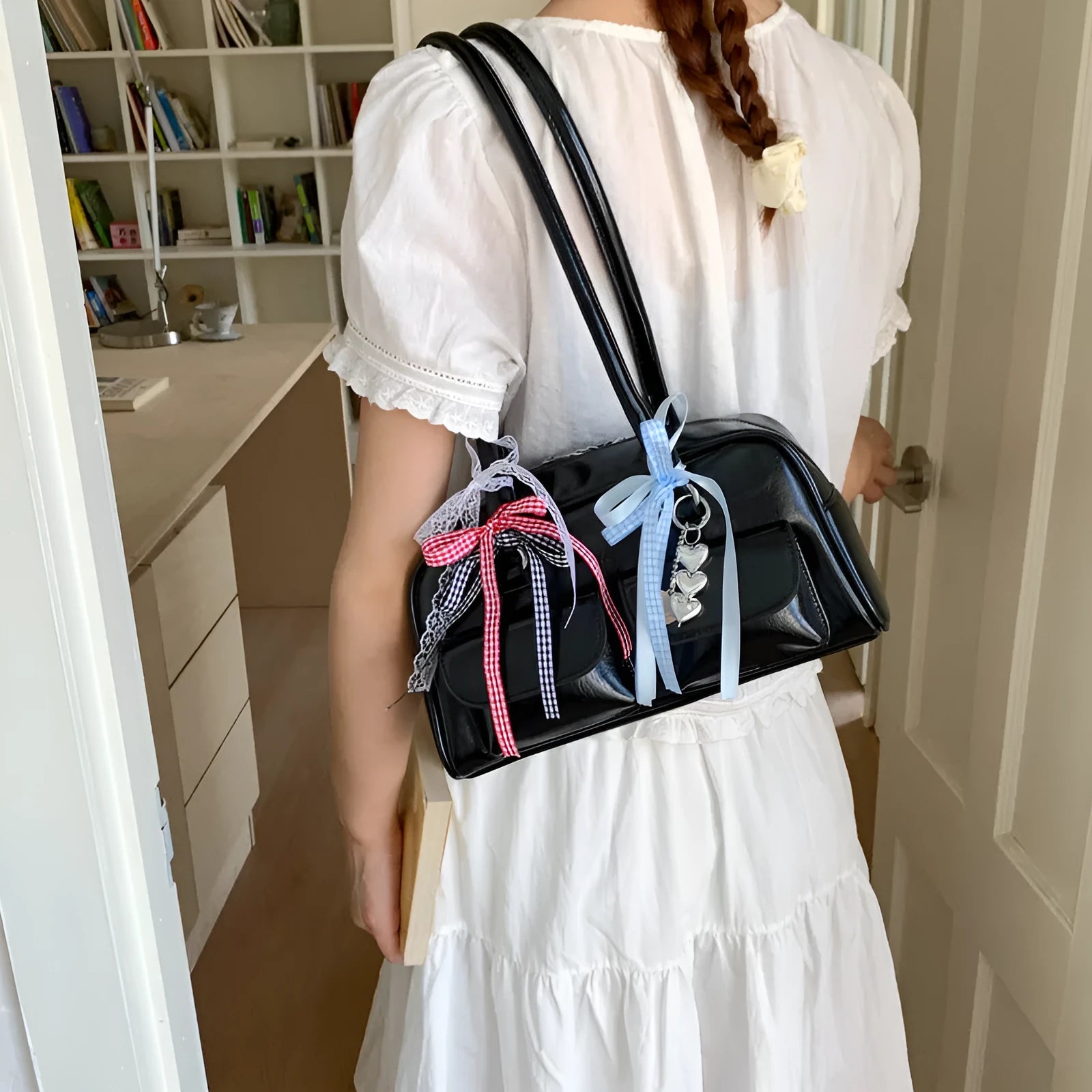 Niche single shoulder bag for women in PU pillow shape, showing internal pockets and available colour options