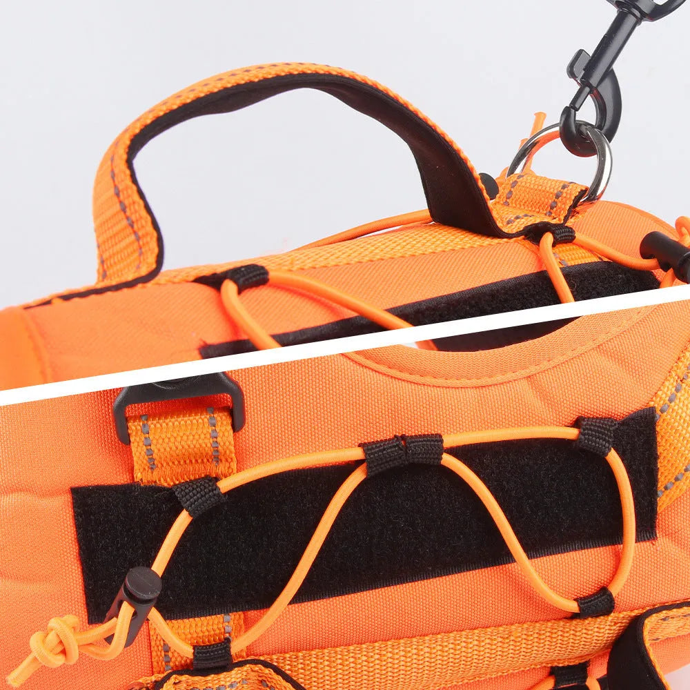 Orange reflective dog vest harness with a black hand-holding rope, shown on a medium-sized dog.