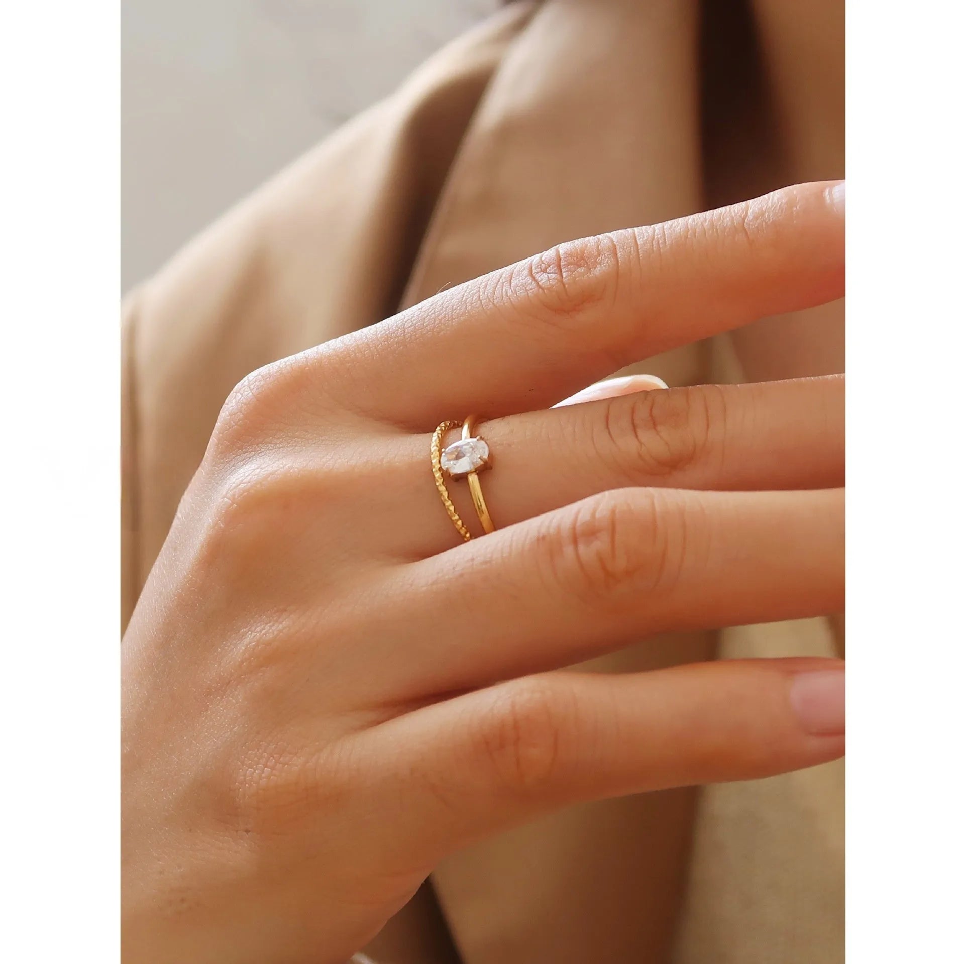 Golden love heart stainless steel ring for women on a simple band, shown in sizes no.5 to no.8