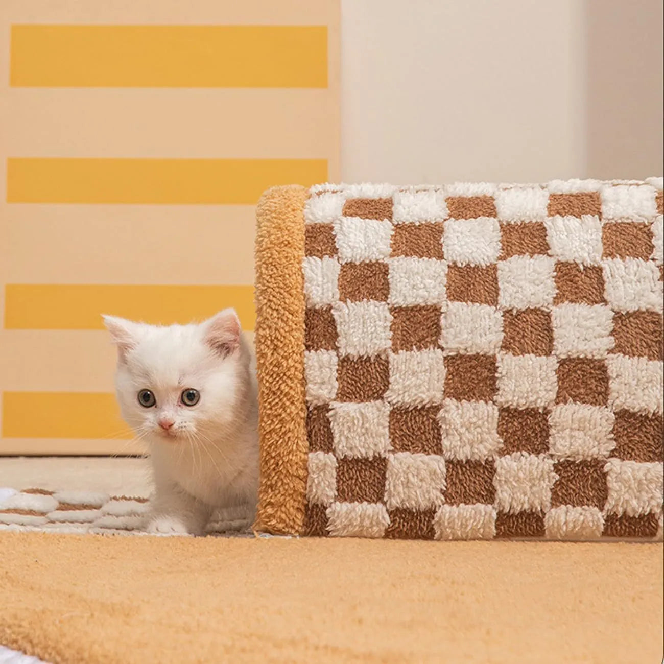 Fan shaped plush pet bed with integrated tunnel in plaid design, shown in coffee colour.