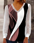 Women's loose purple V-neck top with hollow-out lace print detail and long sleeves.