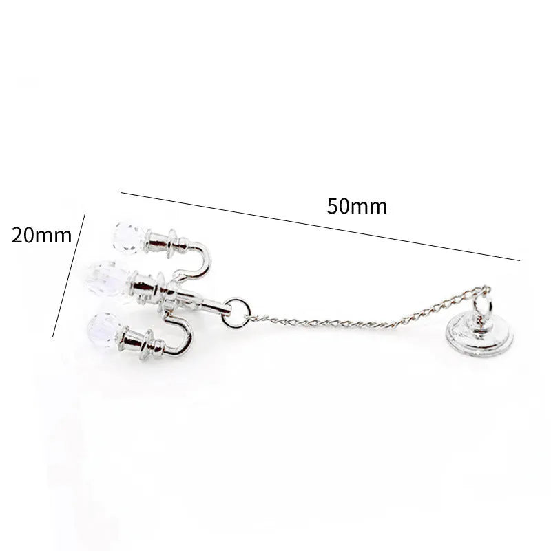 Mini retro gold and silver metal photo prop decorations measuring 5x2 cm