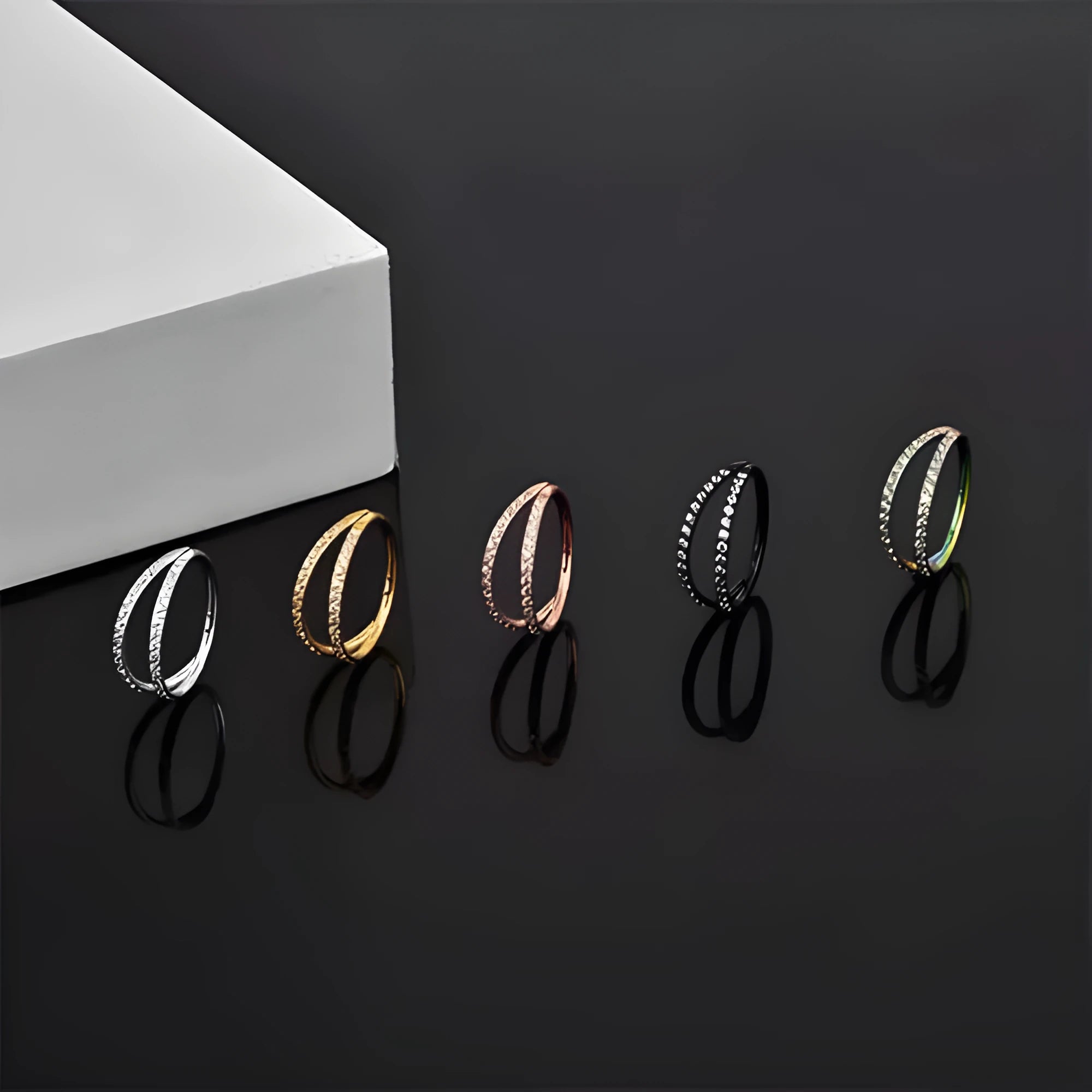 G23 titanium alloy lip and nose ring with zircon diamond finish in gold or steel colour, showing size options.